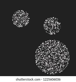 A shiny background of small steal on a black background. Luxurious pattern with silver dust effect.