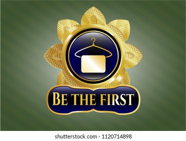  Shiny badge with hanger with towel icon and Be the first text inside