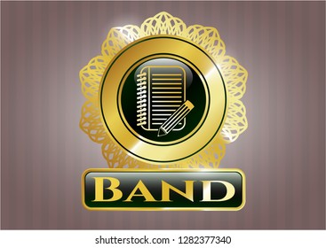 Shiny badge with notebook with pencil icon and Band text inside