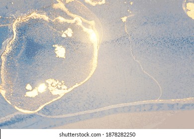 Shiny blue and gold stone marble texture. Alcohol ink technique abstract vector background. Modern paint with glitter. Template for banner, poster design. Fluid art painting