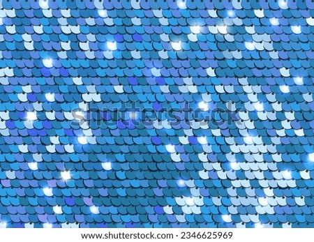 Shiny blue sequins or paillettes on fabric. Glittering sequined shining scales texture. Metallic background