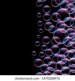 shiny bubbles on black background with text space