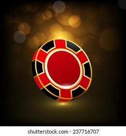 Shiny colorful casino chip on brown abstract background.