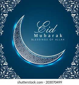 Shiny crescent moon on floral decorated blue background for the occasion of Muslim community festival Eid Mubarak celebrations.