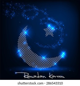 Shiny decorative moon on a blue background for Muslim community festival Eid Mubarak.