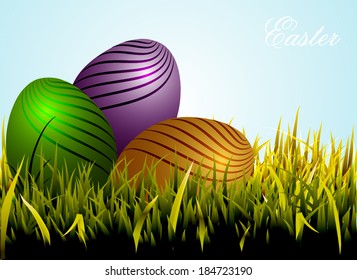 Shiny Eggs on Green Grass for Easter