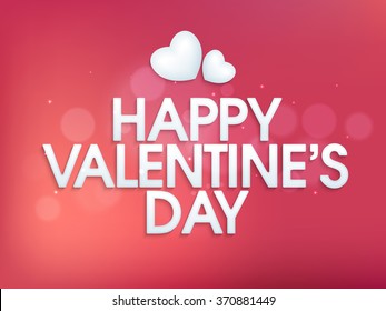 Shiny elegant greeting card design with glossy hearts for Happy Valentine's Day celebration.