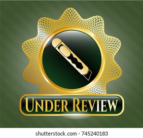  Shiny emblem with cutter icon and Under Review text inside