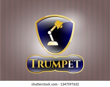  Shiny emblem with desk lamp icon and Trumpet text inside