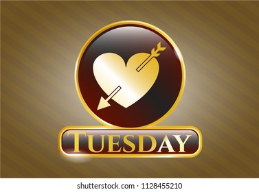  Shiny emblem with heart with arrow icon and Tuesday text inside