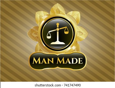  Shiny emblem with scale icon and Man Made text inside