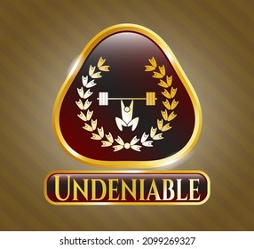 Shiny emblem with weightlifting inside of crown icon and Undeniable text inside