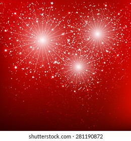Shiny fireworks on red background