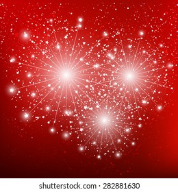 Shiny fireworks on red background