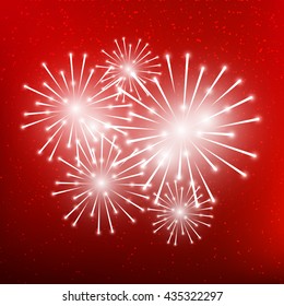 Shiny fireworks on red background