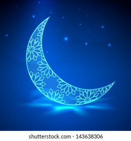 Shiny floral decorative moon on blue background for Muslim community festival Eid Mubarak.