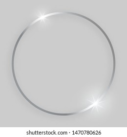 Shiny frame with glowing effects. Silver round frame with shadow on grey background. Vector illustration