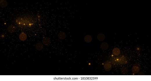 Shiny glittering. Sparkling golden particles, glowing bokeh lights, gold dust isolated on black background	
