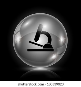 Shiny glossy icon - glass ball on black background
