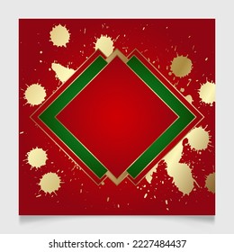 Shiny glowing blank Christmas frame with gold paint splatter. Winter holidays festive golden, red and green background with copy space.