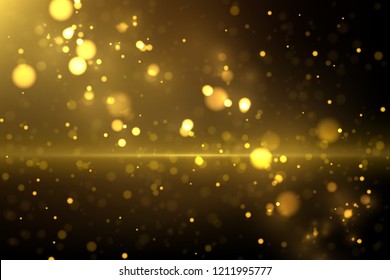 Shiny golden particles on dark. Glowing yellow bokeh abstract luxury background