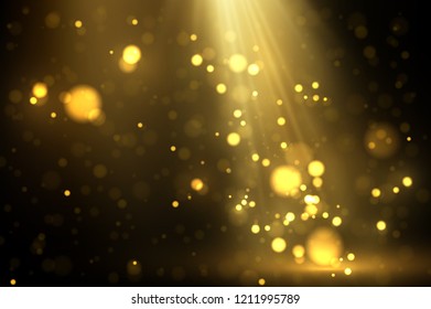 Shiny golden particles on dark. Glowing yellow bokeh abstract luxury background