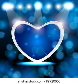 Shiny heart shape on abstract background in blue color. EPS 10, vector illustration.