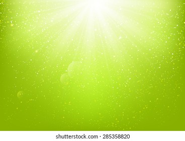 Shiny light on green background