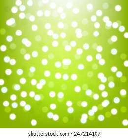 Shiny lights on green background