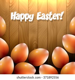 Shiny orange eater eggs on a wooden table, vector background.
