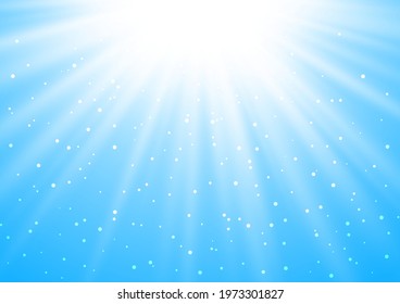 Shiny rays on blue sky background - abstract template for Your design
