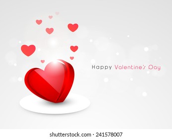 Shiny red 3D love heart on stage for Happy Valentine's Day celebration on grey background.