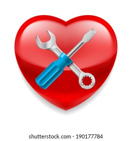 Shiny red heart with crossed working tools