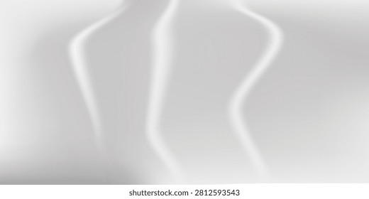 A shiny silver fork placed on a white surface, highlighting its reflective metallic finish and elegant design.