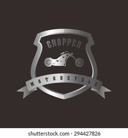 shiny silver shield chopper motorcycle