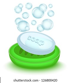 shiny soap with bubbles in a shiny green soap dish