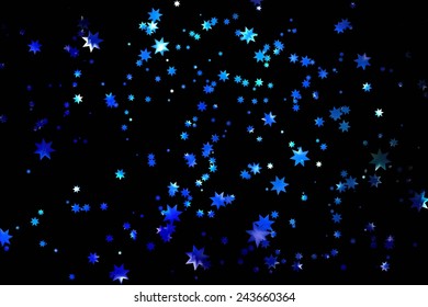 Shiny stars on blue background. vector starry sky
