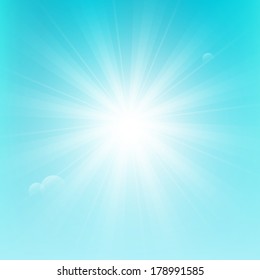 Shiny sun on blue sky background