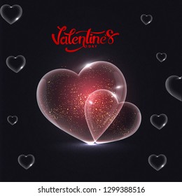 Shiny transparent heart shapes on black background with stylish lettering of Valentine's Day.