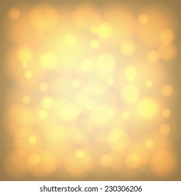 Shiny yellow blurry background with bokeh effect