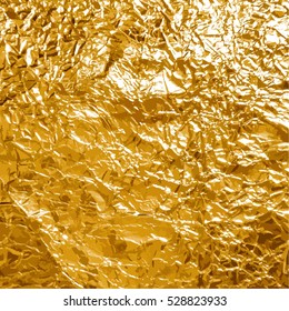 Shiny yellow gold foil abstract texture background