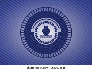 ship icon inside badge with denim texture