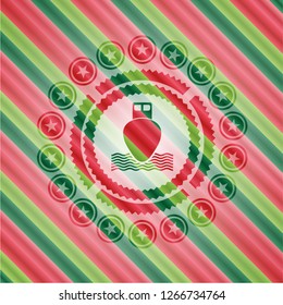 ship icon inside christmas colors style emblem.