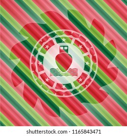 ship icon inside christmas style emblem.