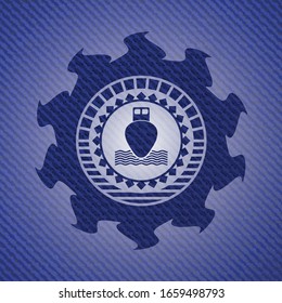 ship icon inside jean or denim emblem or badge background