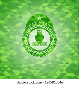 ship icon inside realistic green mosaic emblem