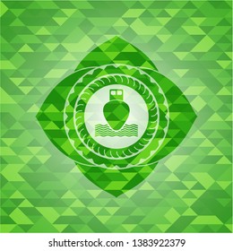ship icon inside realistic green mosaic emblem