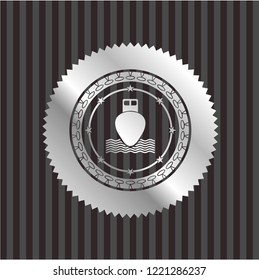 ship icon inside silver emblem or badge