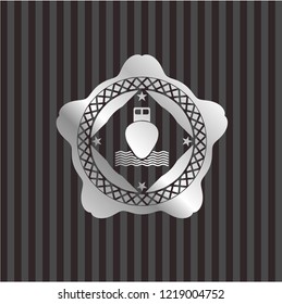 ship icon inside silvery badge or emblem