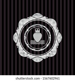 ship icon inside silvery badge or emblem